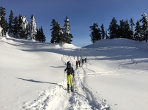 Making our way to Elfin - a group ski touring ahead of us and J. off to the side